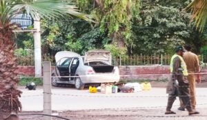 The car allegedly used by one of the gunmen in the Rabwah mosque attack, abandoned near the scene as authorities continue their investigation.